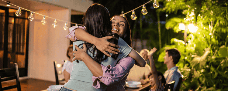 a family member hugging one another